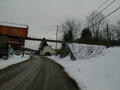 Beams over the road from the new tipple