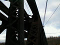 Another look up at the upper deck and at wires carried on the span.