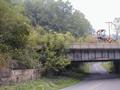 View looking north; Railroad west is left. Heavy equipment was not on span the previous day but appeared on 2 August 2001; Short conversation with men on the bridge revealed span may be being removed soon.